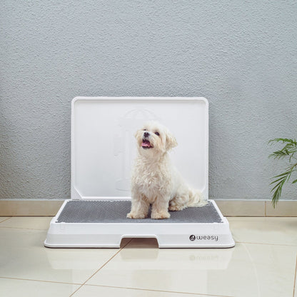 image of a Small dog sitting on the Weasy Smart Potty size Small